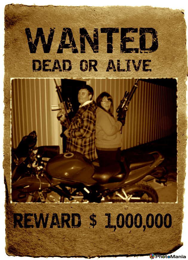 Two individuals, standing back-to-back, holding rifles, posed next to a motorcycle. Text on the image reads "WANTED DEAD OR ALIVE: BONNIE & CLYDE" and "REWARD $1,000,000" in large, bold letters.