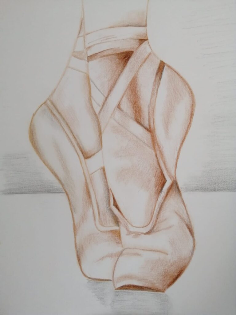 A drawing of ballet pointe shoes, like a dancer's dreaming heart, rests elegantly on a flat surface, depicted in shades of brown and beige. They capture the essence of a shining star in the world of dance.